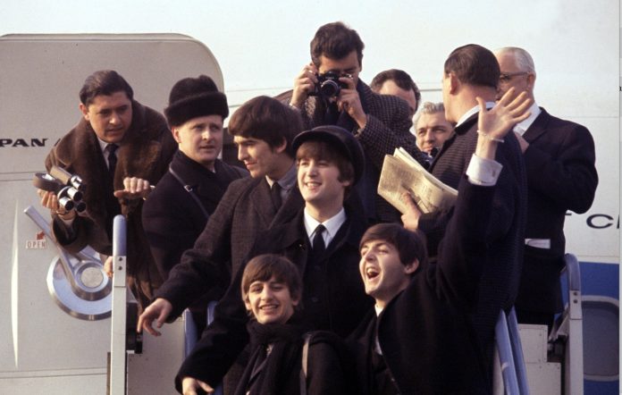 The Beatles arriving in the US in Beatles '64