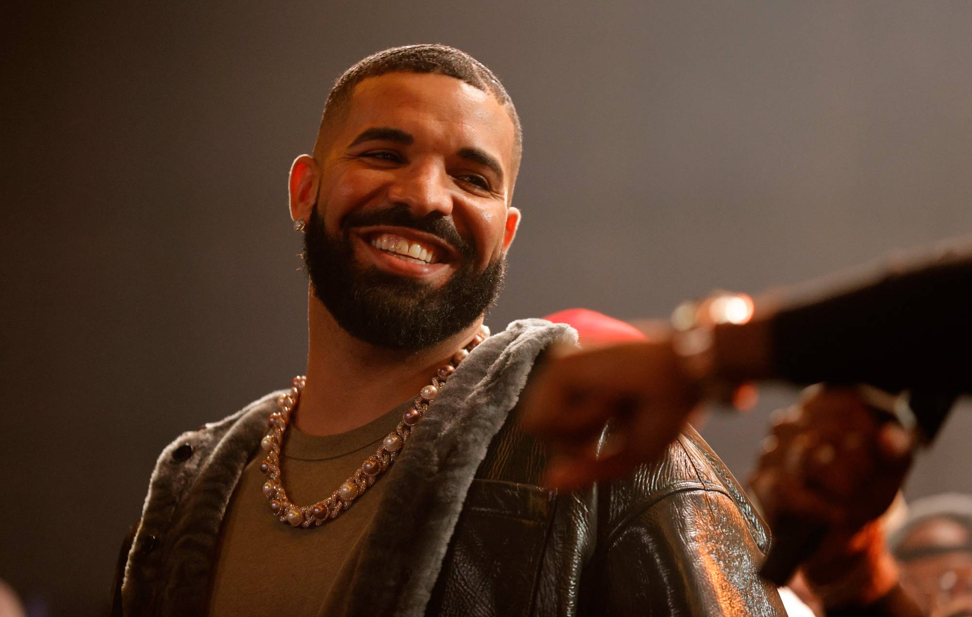 Drake speaks onstage during Drake's Till Death Do Us Part rap battle on October 30, 2021 in Long Beach, California. (Photo by Amy Sussman/Getty Images)
