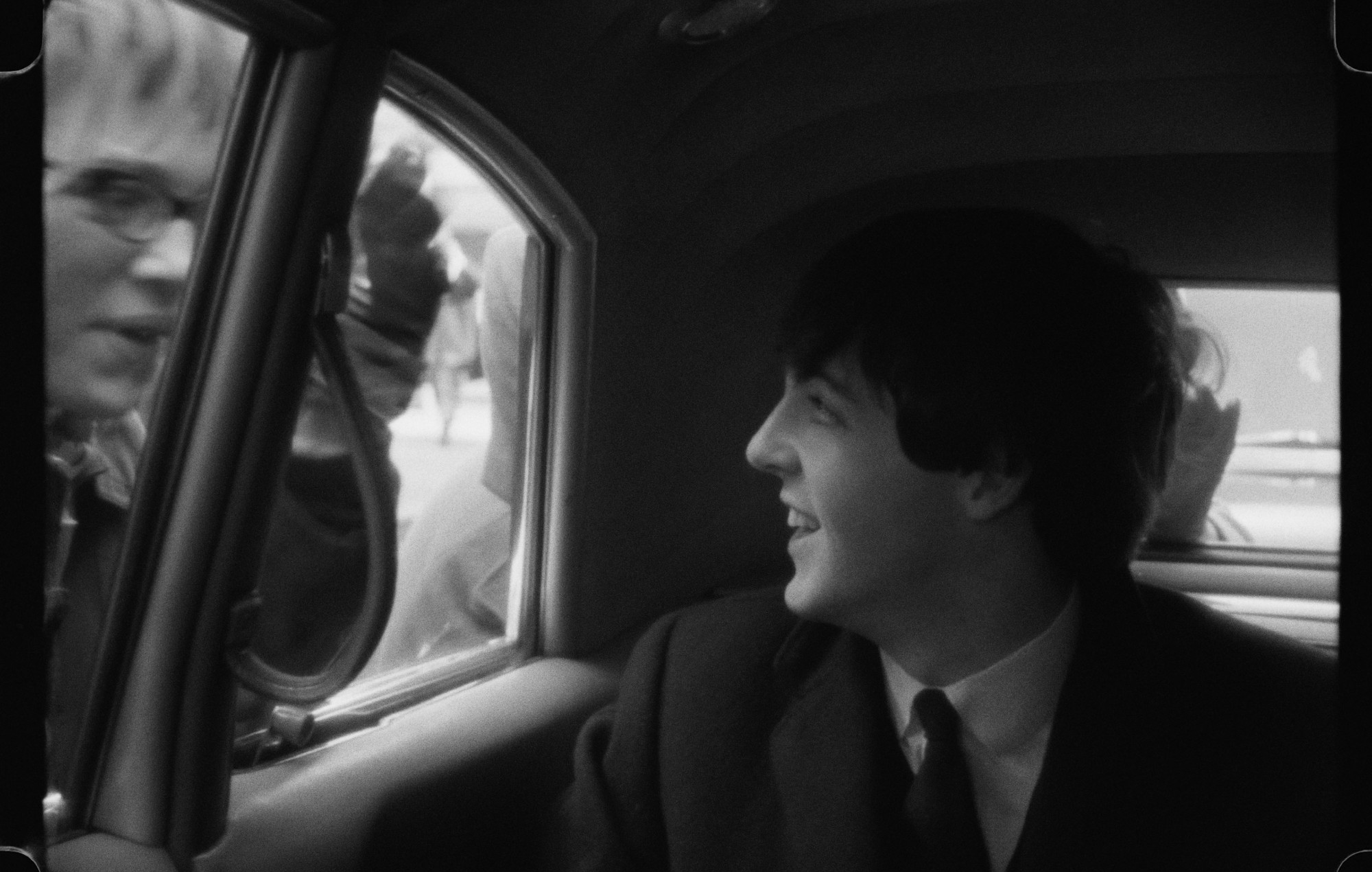 The Beatles visit America.