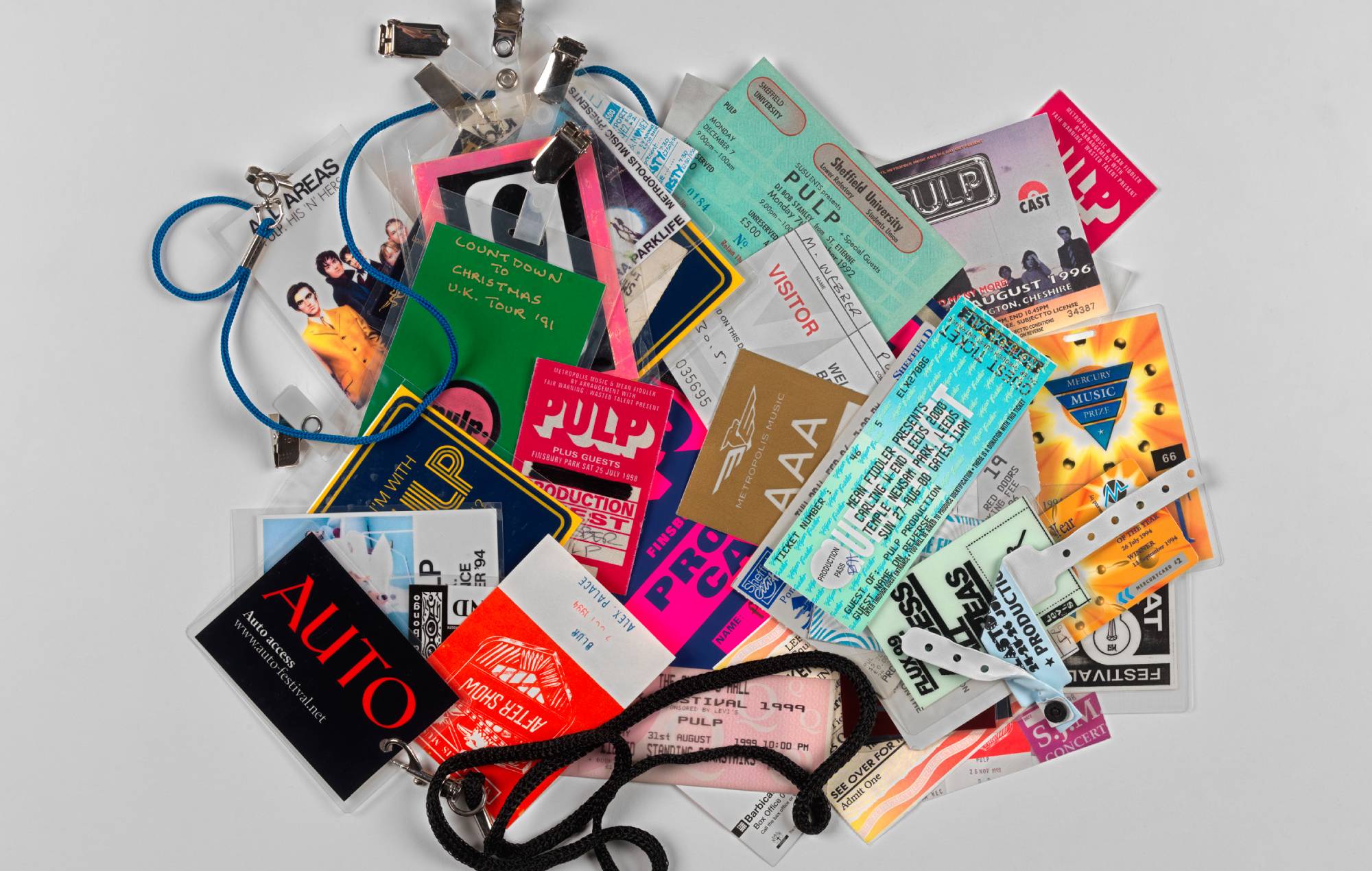 Mark Webber's collection of AAA passes from 'I'm With Pulp – Are You?'. Credit: Mark Webber